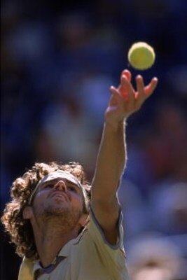 6 Sep 2001:  A close up of Gustavo Kuerten of Brazil as he gets ready to serve during the match against Yevgeny Kafelnikov of Russia for the US Open at the UATA National Tennis Center in Flushing, New York. Kafelnikov defeated Kuerten 6-4, 6-0, 6-3. Manda