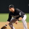 PHOENIX - JULY 10:  Infielder Ross Gload #7 of the Florida Marlins in action during the major league baseball game against the Arizona Diamondbacks at Chase Field on July 10, 2009 in Phoenix, Arizona.  The Diamondbacks defeated the Marlins 8-0.  (Photo by