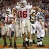 TEMPE, AZ - JANUARY 3:  Quarterback Craig Krenzel #16 of the Ohio State Buckeyes celebrates after scoring the team's first touchdown against the University of Miami Hurricanes during the Tostitos Fiesta Bowl at Sun Devil Stadium on January 3, 2003 in Temp