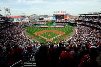 WASHINGTON - APRIL 13:  The teams line up for the National Anthem before the Washington Nationals home opener against the Philadelphia Phillies at Nationals Park on April 13, 2009 in Washington, DC.  (Photo by Greg Fiume/Getty Images)