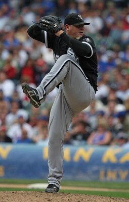 CHICAGO - JUNE 17: Bobby Jenks #45 of the Chicago White Sox pitches in the ninth inning against the Chicago Cubs on his way to a save on June 17, 2009 at Wrigley Field in Chicago, Illinois. The White Sox defeated the Cubs 4-1. (Photo by Jonathan Daniel/Ge