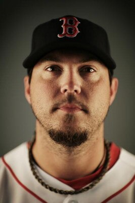 FORT MYERS, FL - FEBRUARY 22:  (EDITOR'S NOTE: IMAGES HAVE BEEN DIGITALLY DESATURATED) Josh Beckett #19 of the Boston Red Sox poses during photo day at the Red Sox spring training complex February 22, 2009 in Fort Myers, Florida  (Photo by Nick Laham/Gett