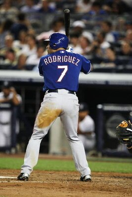 NEW YORK - AUGUST 25:  Ivan Rodriguez #7 of The Texas Rangers in action against The New York Yankees during their game on August 25th, 2009 at Yankee Stadium in the Bronx Borough of New York.  (Photo by Al Bello/Getty Images)