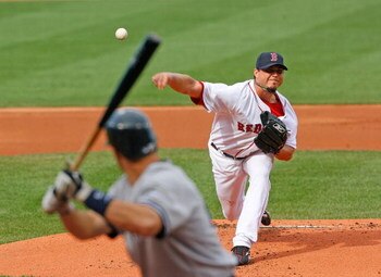 BOSTON - APRIL 25:  Josh Beckett #19 of the Boston Red Sox throws against the New York Yankees at Fenway Park, April 25, 2009, in Boston, Massachusetts. (Photo by Jim Rogash/Getty Images)