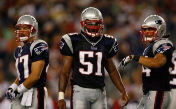 FOXBORO, MA - AUGUST 22: John Lynch #47, Jerod Mayo #51, and Tedy Bruschi #54 of the New England Patriots take a breather against the Philadelphia Eagles during preseason action at Gillette Stadium on August 22, 2008 in Foxboro, Massachusetts. (Photo by J