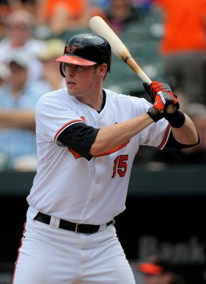 BALTIMORE - JULY 30:  Matt Wieters #15 of the Baltimore Orioles takes an at bat against the Kansas City Royals during MLB action at Oriole Park at Camden Yards on July 30, 2009 in Baltimore, Maryland. The Orioles defeated the Royals 7-3.  (Photo by Doug P