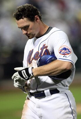 NEW YORK - AUGUST 20:  Daniel Murphy #28 of the New York Mets walks back to the dugout after popping out for the final out of the game against the Atlanta Braves on August 20, 2009 at Citi Field in the Flushing neighborhood of the Queens borough of New Yo