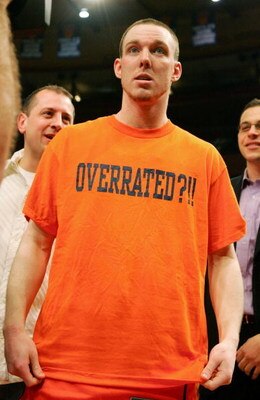 NEW YORK - MARCH 11:  Gerry McNamara #3 of the Syracuse Orange wears an 'Overrated?!!' shirt after defeating the Pittsburgh Panthers 65-61 in the Big East Men's Basketball Championship Final at Madison Square Garden on March 11, 2006 in New York City. McN