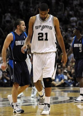 SAN ANTONIO - APRIL 28:   Forward Tim Duncan #21 of the San Antonio Spurs reacts during a 106-93 loss against the Dallas Mavericks in Game Five of the Western Conference Quarterfinals during the 2009 NBA Playoffs at AT&T Center on April 28, 2009 in San An