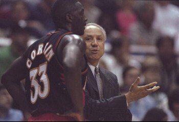 3 Feb 1998:  Head coach Lenny Wilkins and forward Tyrone Corbin of the Atlanta Hawks confer during a game against the Orlando Magic at the Orlando Arena in Orlando, Florida.  The Magic won the game, 91-90. Mandatory Credit: Andy Lyons  /Allsport
