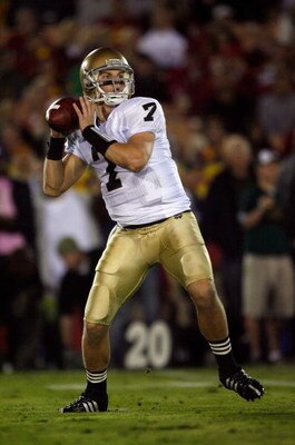 LOS ANGELES, CA - NOVEMBER 29:  Jimmy Clausen #7 of the Notre Dame Fighting Irsh passes against the USC Trojans during the first quarter at the Coliseum on November 29, 2008 in Los Angeles, California.  (Photo by Harry How/Getty Images)