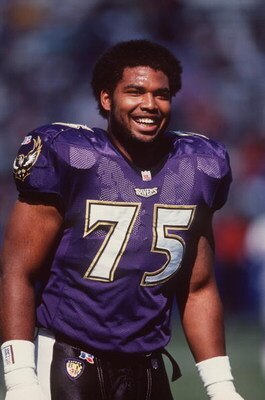 6 Oct 1996:  Offensive lineman Jonathan Ogden of the Baltimore Ravens in action on the field as he shares a smile with teammates during pre game warmups before the Ravens 46-38 loss to the New England Patriots at Memorial Stadium in Baltimore, Maryland. M