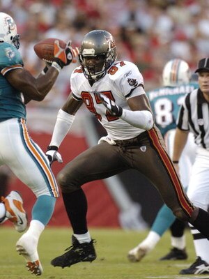 Tampa Bay Buccaneers defensive end Simeon Rice sets on defense   at Raymond James Stadium  in a preseason game August 28, 2004 against he Miami Dolphins.  (Photo by Al Messerschmidt/Getty Images)