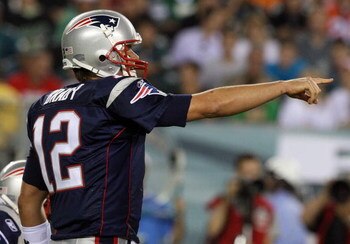 PHILADELPHIA - AUGUST 13:  Tom Brady #12 of the New England Patriots directs his offense against the Philadelphia Eagles on August 13, 2009 at Lincoln Financial Field in Philadelphia, Pennsylvania.  (Photo by Jim McIsaac/Getty Images)
