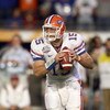 MIAMI - JANUARY 08:  Quarterback Tim Tebow #15 of the Florida Gators moves to pass the ball during the FedEx BCS National Championship Game against the Oklahoma Sooners at Dolphin Stadium on January 8, 2009 in Miami, Florida.  (Photo by Donald Miralle/Get