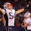 EAST RUTHERFORD, NJ - DECEMBER 29:  Tedy Bruschi #54 of the New England Patriots celebrates on the field at the end of the game against the New York Giants on December 29, 2007 at Giants Stadium in East Rutherford, New Jersey.  (Photo by Jim McIsaac/Getty