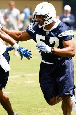 SAN DIEGO - MAY 03: Linebacker Larry English #52 of the San Diego Chargers runs upfield in pursuit during minicamp practice at the team's training facility on May 3, 2009 in San Diego, California. (Photo by Kevin Terrell/Getty Images)