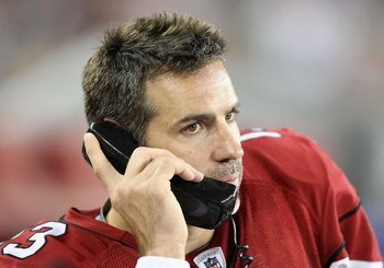 GLENDALE, AZ - AUGUST 22:  Quarterback Kurt Warner #13 of the Arizona Cardinals talks on the phone during the preseason NFL game against the San Diego Chargers at the Universtity of Phoenix Stadium on August 22, 2009 in Glendale, Arizona. The Chargers def