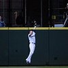 SEATTLE - AUGUST 25:  Left fielder Michael Saunders #55 of the Seattle Mariners makes a leaping catch in the second inning against the Oakland Athletics on August 25, 2009 at Safeco Field in Seattle, Washington. (Photo by Otto Greule Jr/Getty Images)