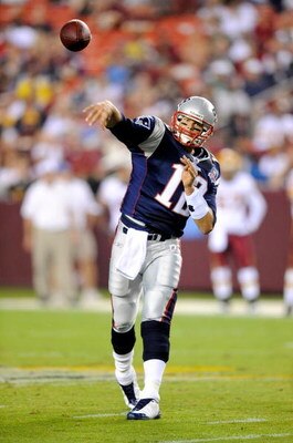 LANDOVER, MD - AUGUST 28:  Tom Brady #12 of the New England Patriots throws a pass in a preseason game against the Washington Redskins at FedExField on August 28, 2009 in Landover, Maryland.  (Photo by Greg Fiume/Getty Images)