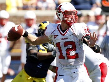 ANN ARBOR, MI - SEPTEMBER 06: Daniel Raudabaugh #12 of the Miami of Ohio Red Hawks gets ready to throw a pass while playing the Michigan Wolverines on September 6, 2008 at Michigan Stadium in Ann Arbor, Michigan. Michigan won the game 16-6.  (Photo by Gre