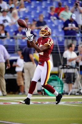 BALTIMORE, MD - AUGUST 13:  Malcolm  Kelly #12 of the Washington Redskins makes a catch during warm ups of a NFL preseason football game against the Baltimore Ravens on August 13, 2009 at M & T Bank Stadium in Baltimore, Maryland.   (Photo by Mitchell Lay