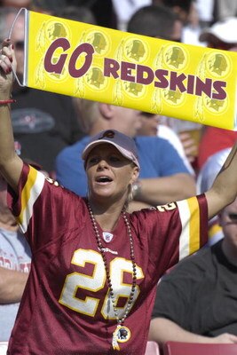 TAMPA, FL - NOVEMBER 25: A fan of the Washington Redskins cheers play against the Tampa Bay Buccaneers at the Raymond James Stadium on November 25, 2007 in Tampa, Florida.  The Bucs won 19-13. (Photo by Al Messerschmidt/Getty Images) *** Local Caption ***