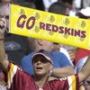 TAMPA, FL - NOVEMBER 25: A fan of the Washington Redskins cheers play against the Tampa Bay Buccaneers at the Raymond James Stadium on November 25, 2007 in Tampa, Florida.  The Bucs won 19-13. (Photo by Al Messerschmidt/Getty Images) *** Local Caption ***