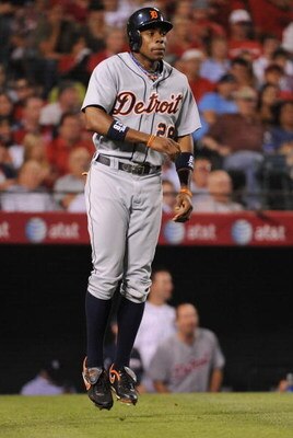 ANAHEIM, CA - AUGUST 25:  Curtis Granderson #28 of the Detroit Tigers celebrates after scoring a run for a 4-3 lead over the Los Angeles Angels of Anaheim during the seventh inning at Angel Stadium of Anaheim on August 25, 2009 in Anaheim, California.  (P