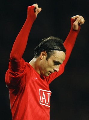 MANCHESTER, UNITED KINGDOM - OCTOBER 18:  Dimitar Berbatov of Manchester United celebrates as he scores their third goal during the Barclays Premier League match between Manchester United and West Bromwich Albion at Old Trafford on October 18, 2008 in Man