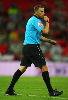 LONDON, ENGLAND - JULY 24: Referee Mark Halsey blows his whistle during the Wembley Cup match between Tottenham Hotspur and Barcelona at Wembley Stadium on July 24, 2009 in London, England.  (Photo by Richard Heathcote/Getty Images)