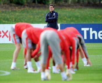 ST ALBANS, ENGLAND - SEPTEMBER 08:  Fabio Capello the England manager watches his players during training at London Colney on September 8, 2009 in St Albans, England.  (Photo by Shaun Botterill/Getty Images)