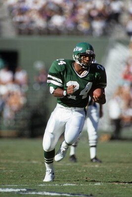 SAN DIEGO, CA - DECEMBER 2:  Running back Freeman McNeil #24 of the New York Jets runs the ball during a game against the San Diego Chargers at Jack Murphy Stadium on December 2, 1990 in San Diego, California.  The San Diego Chargers won 38-17  (Photo by 