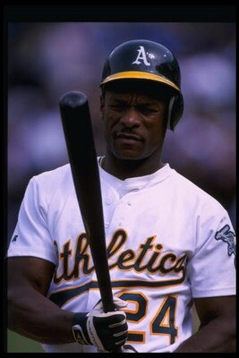 4 Apr 1998:  Rickey Henderson #24 of the Oakland Athletics looks on during a game against the New York Yankees at the Oakland Coliseum in Oakland, California. The Athletics defeated the Yankees 5-3. Mandatory Credit: Otto Greule Jr.  /Allsport