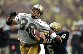 5 Dec 1998:  Fullback Craig Stucker #36 of the Army Cadets in action against cornerback Bas Williams #6 of the Navy Midshipmen during the game at Veterans Stadium in Philadelphia, Pennsylvania. The Army defeated the Navy 34-31. Mandatory Credit: M. David 