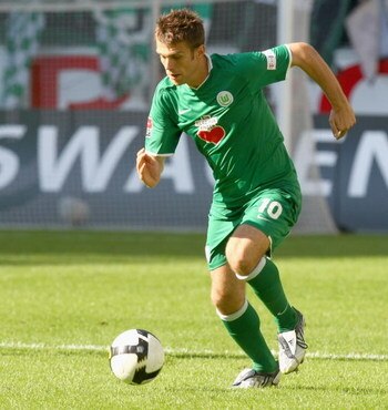 WOLFSBURG, GERMANY - AUGUST 30:  Zvjezdan Misimovic of Wolfsburg runs with the ball during the Bundesliga match between VfL Wolfsburg and Eintracht Frankfurt at the Volkswagen Arena on August 30, 2008 in Wolfsburg, Germany.  (Photo by Martin Rose/Bongarts