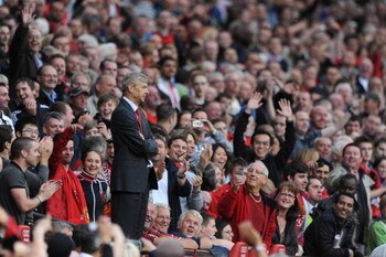MANCHESTER, ENGLAND - AUGUST 29:  Arsenal Manager Arsene Wenger looks on after being sent to the stands during the Barclays Premier League match between Manchester United and Arsenal at Old Trafford on August 29, 2009 in Manchester, England.  (Photo by La