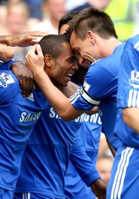 LONDON, ENGLAND - AUGUST 29:  Ashley Cole of Chelsea celebrates with teammate John Terry after scoring the third goal during the Barclays Premier League match between Chelsea and Burnley at Stamford Bridge on August 29, 2009 in London, England.  (Photo by