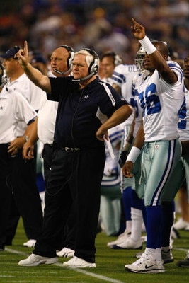 MINNEAPOLIS, MN - SEPTEMBER 4:  Head coach Wade Phillips of the Dallas Cowboys signals a play from the sidelines during action against the Minnesota Vikings at Hubert H. Humphrey Metrodome on September 4, 2009 in Minneapolis, Minnesota. The Cowboys defeat