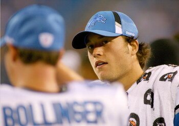 ORCHARD PARK, NY - SEPTEMBER 03: Matthew Stafford #9 of the Detroit Lions talks with teammate Brooks Bollinger #14 during a preseason game against the Buffalo Bills at Ralph Wilson Stadium on September 3, 2009 in Orchard Park, New York.  (Photo by Rick St