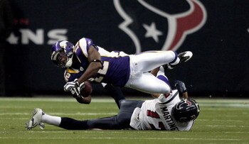HOUSTON - AUGUST 31:  Percy Harvin #12 of the Minnesta Vikings is tackled by Glenn Martinez #17 of the Houston Texans during their game at Reliant Stadium on August 31, 2009 in Houston, Texas.  (Photo by Bob Levey/Getty Images)
