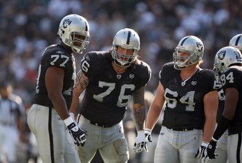 OAKLAND, CA - NOVEMBER 2:  (L-R) Offensive Linemen Kwame Harris #77, Robert Gallery #76 and Jake Grove #64 of the Oakland Raiders look on during a break in play against the Atlanta Falcons on November 2, 2008 at the Oakland-Alameda County Coliseum in Oakl