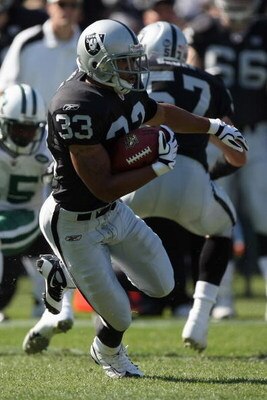 OAKLAND, CA - OCTOBER 19:  Tyvon Branch #33 of the Oakland Raiders returns a kick during the game against the New York Jets on October 19, 2008 at the Oakland-Alameda County Coliseum in Oakland, California. (Photo by Jed Jacobsohn/Getty Images)