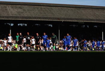 LONDON, ENGLAND - AUGUST 23:  The Chelsea and Fulham teams walk out onto the pitch ahead of the Barclays Premier League match between Fulham and Chelsea at Craven Cottage on August 23, 2009 in London, England.  (Photo by Jamie McDonald/Getty Images)