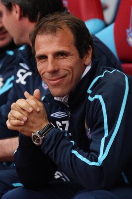 LONDON, ENGLAND - APRIL 25: Manager of West Ham United Gianfranco Zola smiles during the Barclays Premier League match between West Ham United and Chelsea at Upton Park on April 25, 2009 in London, England.  (Photo by Hamish Blair/Getty Images)