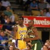LOS ANGELES - 1990:  Sedale Threatt #4 of the Seattle Supersonics and Michael Cooper #21 of the Los Angeles Lakers battle for position during a game in the 1989-1990 NBA season at the Great Western Forum in Los Angeles, California.  (Photo by Ken Levine/G