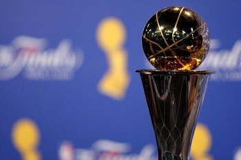 ORLANDO, FL - JUNE 14:  The Bill Russell MVP trophy is shown as Kobe Bryant #24 of the Los Angeles Lakers speaks to the media after the Lakers defeated the Orlando Magic in Game Five of the 2009 NBA Finals on June 14, 2009 at Amway Arena in Orlando, Flori