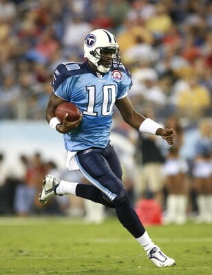 NASHVILLE, TN - SEPTEMBER 3: Vince Young #10 of the Tennessee Titans runs with the ball against the Green Bay Packers during a preseason NFL game at LP Field on September 3, 2009 in Nashville, Tennessee. (Photo by Joe Murphy/Getty Images)