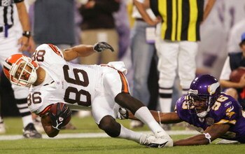 MINNEAPOLIS - NOVEMBER 27: Dennis Northcutt #86 of the Cleveland Browns is pulled down by E.J. Henderson #56 of the Minnesota Vikings on November 27, 2005 at the Hubert H. Humphrey Metrodome in Minneapolis, Minnesota. The Minnesota Vikings defeated the Cl
