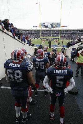 ORCHARD PARK, NY - DECEMBER 28:  Langston Walker #68, Duke Preston #75 and Trent Edwards #5 of the Buffalo Bills wait to walk on the field before the game against the New England Patriots on December 28, 2008 at Ralph Wilson Stadium in Orchard Park, New Y
